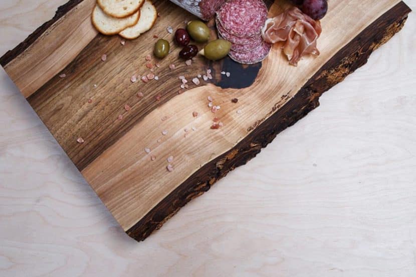 walnut wood wood cutting board with bark