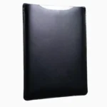 Black leather MacBook sleeve displayed at angle, showing jet-black leather finish, stitched edges, and protective padded form