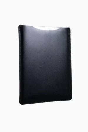 Black leather MacBook sleeve displayed at angle, showing jet-black leather finish, stitched edges, and protective padded form