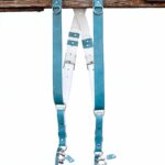 Full display of Blue Sirocco leather camera harness showing complete X-design with turquoise shoulder straps, white center X-strap with teal leather accent patches, metal square connectors, adjustable leather segments, and dual metal carabiner clips with leather tags