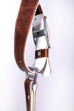 Side profile detail of Brown Vintage White Padding harness showing the curved white padded construction, brown leather outer bands, metal connector, and layered harness structure
