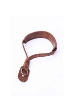 Full view of a brown leather wrist strap loop with stitched end tab.