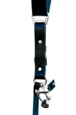 Detailed view of Green Amulet harness showing metal ring connector, leather patch segments with rivets, and teal color gradient on strap