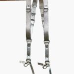 Complete front display of Grey Flower Embossed leather camera harness showing dual silver-grey shoulder straps with embossed floral design, light to dark grey ombre center strap, metal D-rings, square connectors, adjustable leather accent bands, and carabiner clips with leather tags