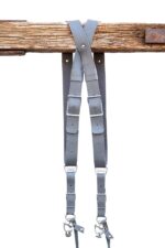 Grey Sandstone leather camera harness lay-flat view showing complete X-harness structure with dual shoulder straps, multiple adjustable leather patch segments, and metal hardware