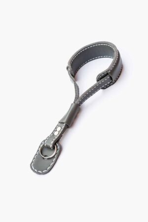 Full view of a grey leather wrist strap with metal hook clasp