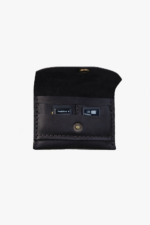 Dark brown leather battery and SD card holder opened to show storage slots with memory cards inside on a light gray background.
