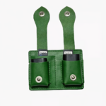 Green leather dual battery holder with two hanging tabs on a light background.