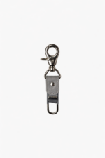 Gray leather key clip with swivel clasp and loop attachment on a light background.