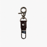 Dark brown leather key clip with swivel clasp and loop attachment on a light background.