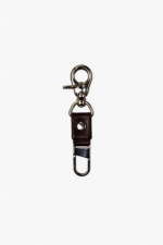 Dark brown leather key clip with swivel clasp and loop attachment on a light background.