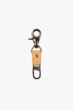Light brown leather key clip with swivel clasp and loop attachment on a light background.