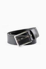 Black leather belt with silver buckle on white background