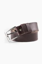 Dark brown leather belt with silver buckle on white background