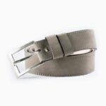 Light gray leather belt with silver buckle on white background