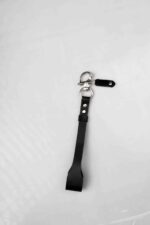 Single black leather strap with metal swivel clasp, product shot on a white background.