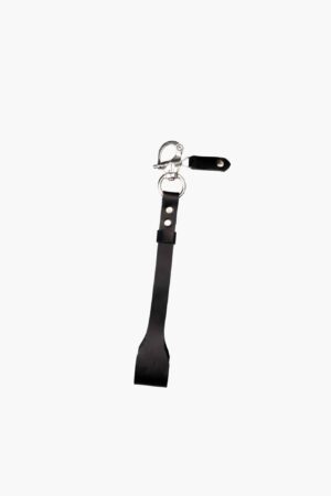 Black leather camera wrist strap with swivel clasp, isolated product shot on white.
