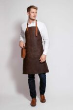Classic leather apron in green – front view showing full-length design