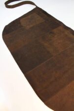Short suede leather apron with back pocket – detail of leather texture and stitching