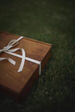 Wood album box big open showing two compartments with cotton flower and lavender decoration