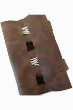 green leather cord organizer