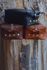 genuine leather toiletry bag open showing spacious interior