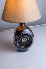 Handcrafted Vecchia Romagna bottle lamp – amber glass glow