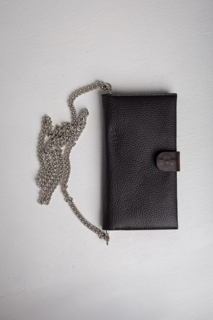 Dark brown leather wallet on chain front view with snap tab closure