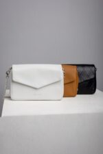 Leather chain crossbody bag colour range in white, tan and black quilted