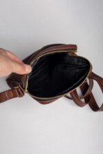 Interior of the brown leather reporter bag with lined main compartment