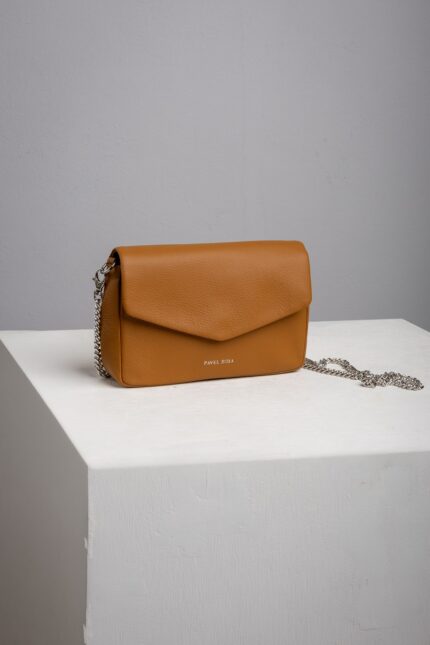 Tan leather chain crossbody bag with envelope flap front view