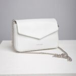 White leather chain crossbody bag with envelope flap front view
