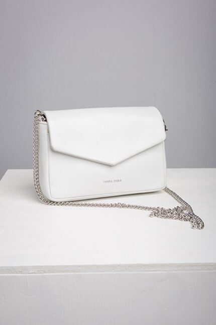 White leather chain crossbody bag with envelope flap front view