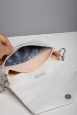 White leather chain crossbody bag interior lining and card pocket