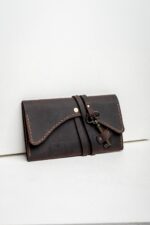 Vintage brown leather tobacco pouch closed front view