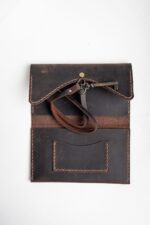 Inside of the vintage brown leather tobacco pouch with card pocket