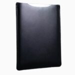 Black leather MacBook sleeve displayed at angle, showing jet-black leather finish, stitched edges, and protective padded form