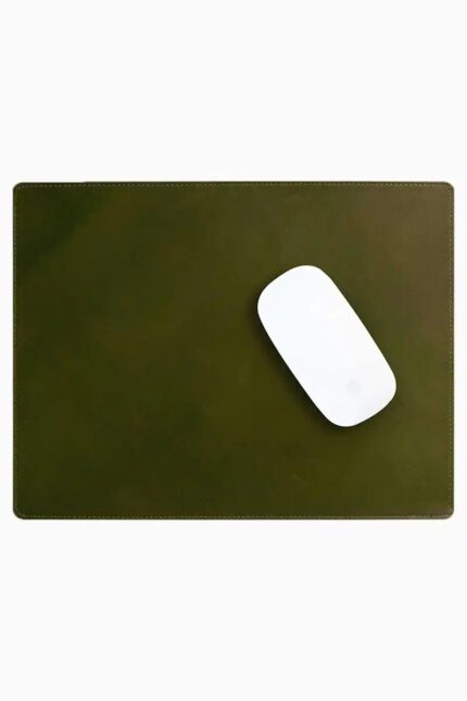Olive green leather mouse pad with tone-on-tone perimeter stitching and rounded corners, with a white wireless mouse placed on the right side, top-down view on a white background.