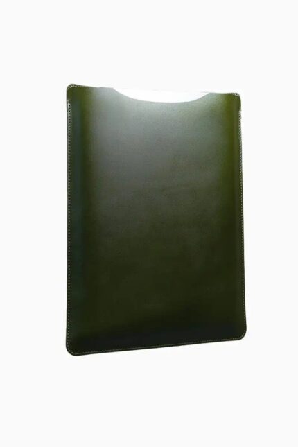 Green leather MacBook sleeve with stitched edges, displayed at angle showing protective padded interior and minimalist design